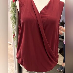 DKNY burgundy sleeveless blouse. Size medium washable.
